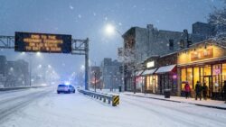 Heavy snow is expected to begin tonight as authorities urge drivers to stay home, while businesses push to keep normal operations running